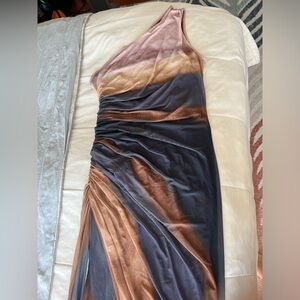 This is a stunning, never worn, multi colored, long dress! Size XL